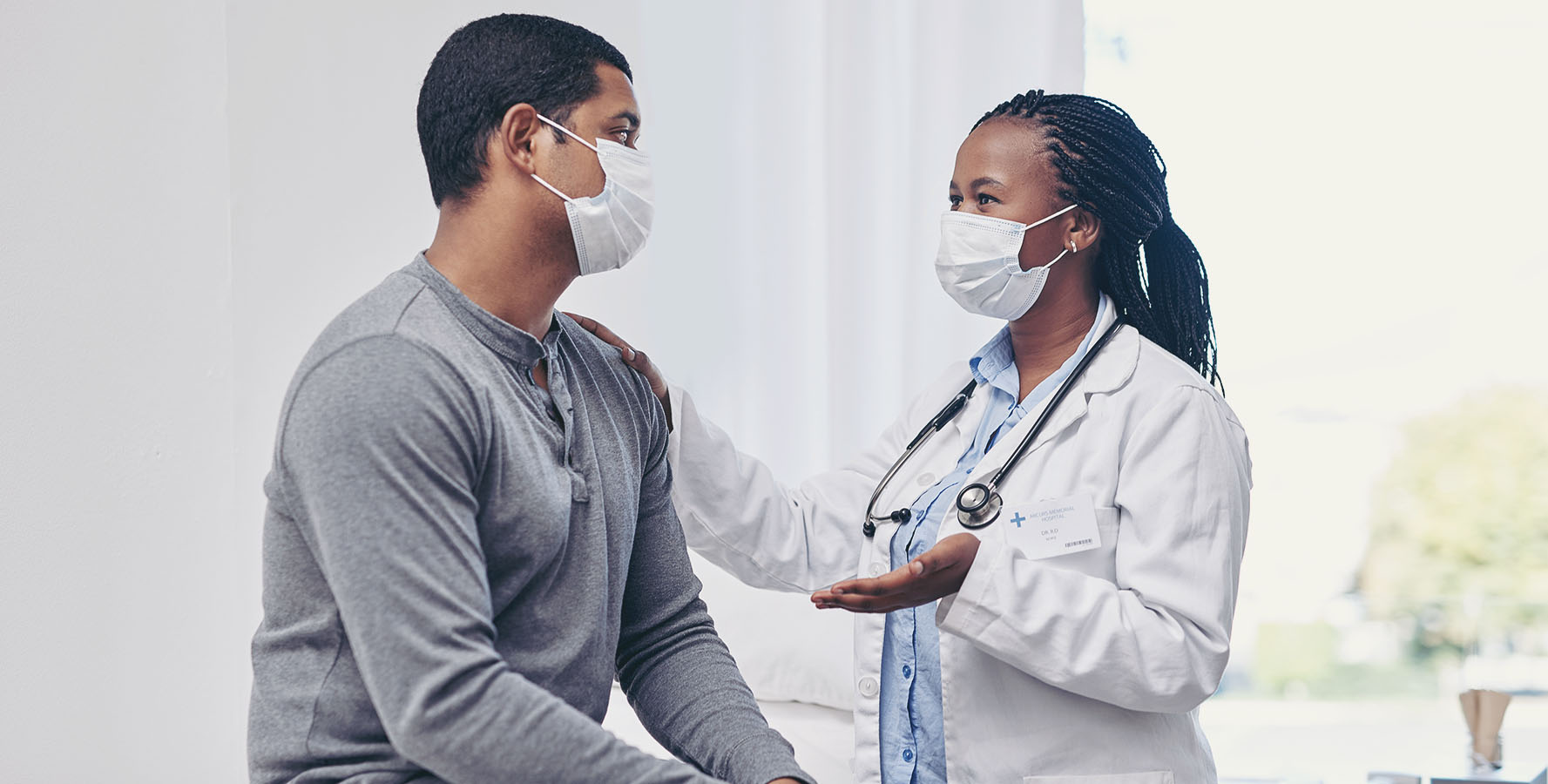 Doctor talking to patient.