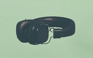 headphones on green background