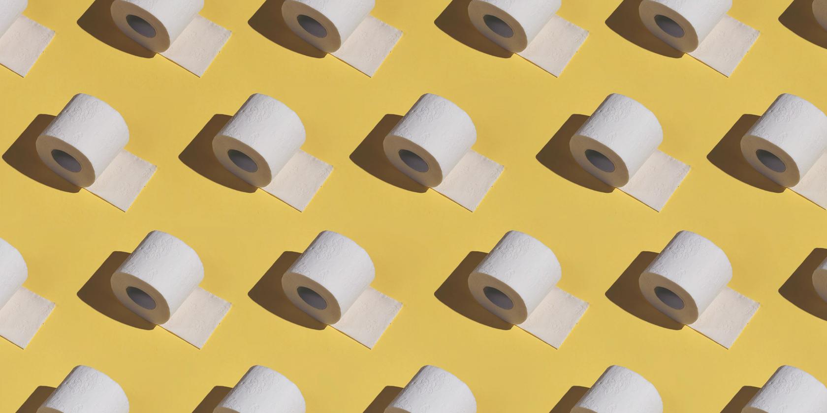 Yellow background with toilet paper.